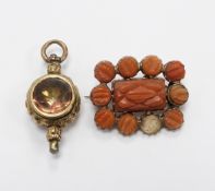 Victorian brooch set with coral and a Victorian pocket watch key