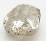 A loose uncut diamond, 0.56g