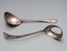 Two continental white metal serving spoons, one with Dutch silver marks the other marked 800, each