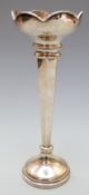 Elizabeth II hallmarked silver trumpet vase with shaped rim and hexagonal central portion,