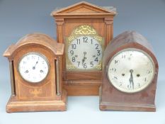 Early 20thC oak cased wall clock with stylised Arabic numerals and two train movement, 58cm tall,