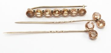 Victorian brooch (4.5cm) set with chrysoberyl and two matching stick pins