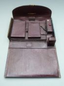 Parkins & Cottu, Oxford St. tooled leather gilt metal mounted travelling desk set with pockets,