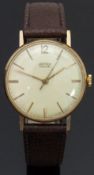 Vertex Revue 9ct gold gentleman's wristwatch with gold hands and baton markers, champagne dial and