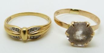 A yellow metal ring set with diamonds and a yellow metal ring set with paste, 4.2g