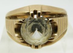 A 9ct gold ring set with paste, 8.1g (size S)