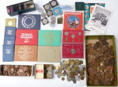 A collection of approximately 35 modern UK crowns, uncirculated UK coin sets etc, together with