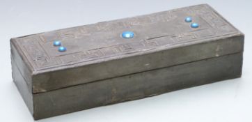 Arts & Crafts pewter box set with five blue cabochons, length 31cm