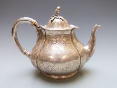 Victorian hallmarked teapot of bulbous lobed form, London 1854 maker Smith, Nicholson & Co, height
