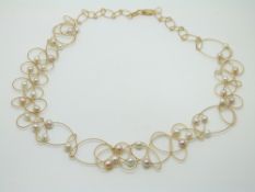 An 18ct gold pearl choker necklace