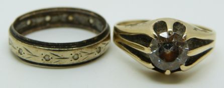 A 9ct gold ring set with paste (size N) and a 9ct gold eternity ring, 5.1g (size N)