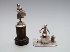 Two Dutch or similar white metal miniature novelty figures, one depicting a lady with drum on turned