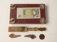 A set of brass sovereign scales, Victorian spy penny, banknote press etc