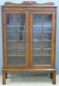Oak glazed display or bookcase with adjustable shelves, W86 x D28 x H130cm