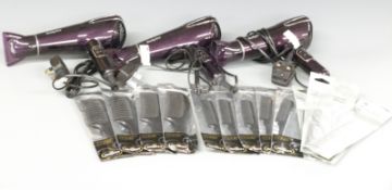 Three Babyliss hairdryers with a collection of Denman combs, new in packets