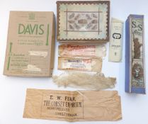 Vintage clothing packaging including Corset Emporium, Montpellier, Cheltenham and a vintage Austin