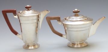 Walker & Hall Art Deco hallmarked silver teapot and hot water jug of stepped tapering design,