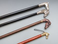 Four walking canes with novelty horse handles