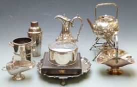 A quantity of silver plated ware including a spirit kettle, cocktail shaker, wine cooler, salver,