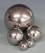 Assorted ballbearings of different sizes and weights, approximately 60 in all, some weighing 5kg