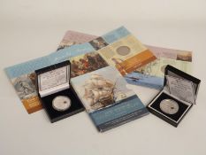 Two cased silver proof commemorative coins for the Battle of Trafalgar and a brilliant