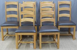Six contemporary oak dining chairs with upholstered seats