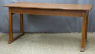Arts & Crafts style oak refectory table with sleigh type feet, believed purchased from Liberty of
