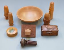 Five turned treen sewing and similar containers, wooden whistle, lemonwood bowl, carved box with