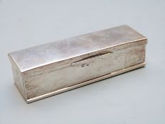 Edward VII hallmarked silver box with hinged lid and front panels and gilt interior, Birmingham 1909