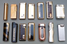 Fourteen mainly Colibri lighters including a Guinness advertising example.