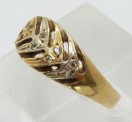 An 18ct gold ring in the form of a feather set with diamonds (size M/N)
