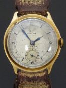 Omega 9ct gold gentleman's wristwatch with inset subsidiary seconds dial, blued hands, silver dial