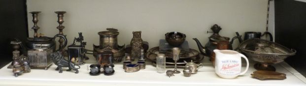 A quantity of silver plate and other metalware including serving trays, a pair of candlesticks,
