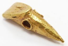 A yellow metal charm, 1.6g