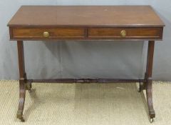 19thC style mahogany sofa table with two drawers, the reeded legs united by a turned and reeded