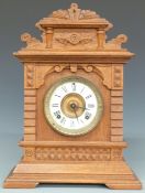 Ansonia oak table/mantel clock in carved case with Roman dial and beetle and poker hands, striking