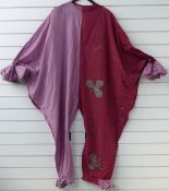 A 19th/20thC jester type costume with ace of clubs embroidered decoration and with frilled sleeves