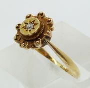 Victorian 18ct gold ring set with an old cut diamond in a star setting (size K)