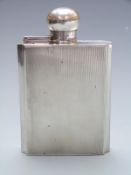 Art Deco style hallmarked silver hip flask with engine turned decoration and bayonet lid, Birmingham