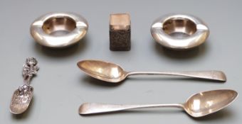 A pair of Georgian hallmarked silver spoons, a white metal spoon or shovel marked 800, a pair of