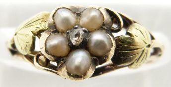 An early Victorian ring set with a rose cut diamond surrounded by pearls, in original box for