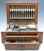 Silver plated 12 place setting canteen of King's pattern cutlery in oak wellington type two drawer