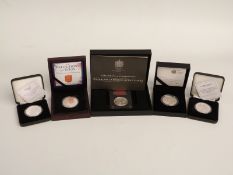 Four cased silver proof or piedfort £5 coins including 2010 Restoration of the Monarchy, 75th