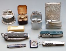 Lighters including Dunhill Rollalite, folding tools and knives and a travelling inkwell