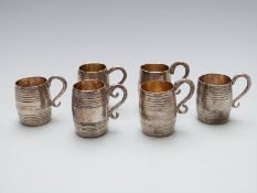A set of six 19thC Italian white metal novelty tankards with gilt interiors, various marks 1832-
