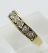 A 9ct gold half eternity ring set with approximately 0.25ct of diamonds (size M)