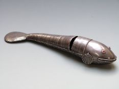 Articulated white metal fish with gem or similar set eyes, length 31cm, weight 358g all in