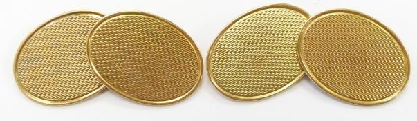 A pair of 18ct gold cufflinks with engine turned decoration, 10.4g