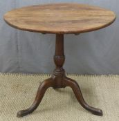 19thC circular oak tilt top table, diameter 75cm