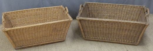 Two wicker twin handled log or similar baskets, each approximately L84 x D56 x H41cm